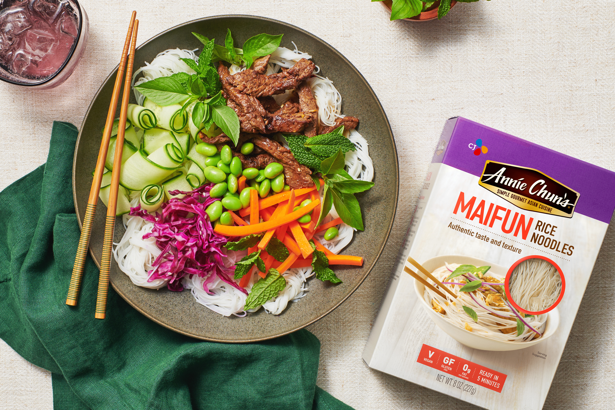 Food styling and recipe development for Maifun rice noodles packaging design shot from above on table.
