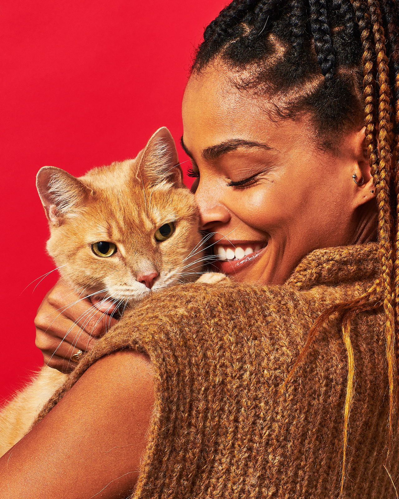 Woman holding cat, Delectables pet food photography.