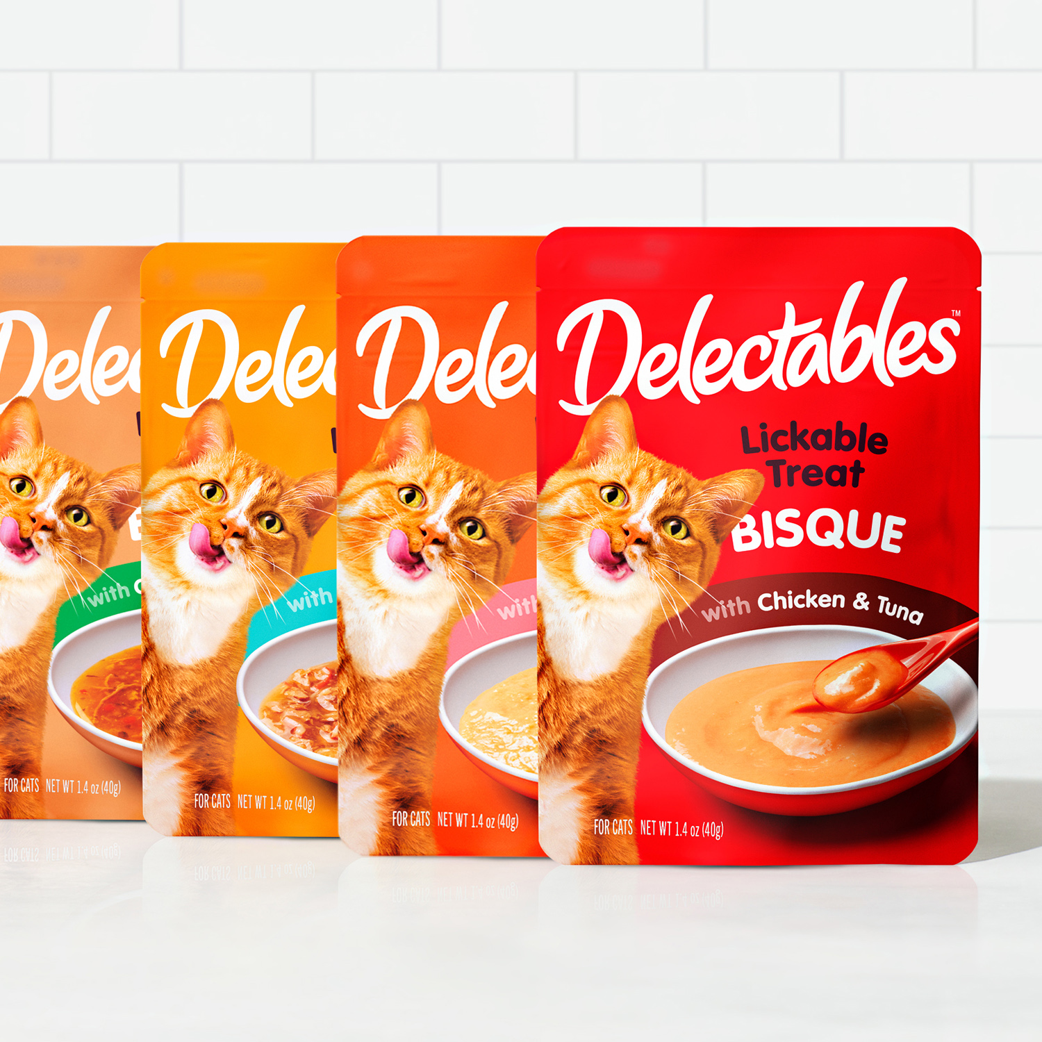 Delelctables brand refresh Lickable Treat packaging lineup.